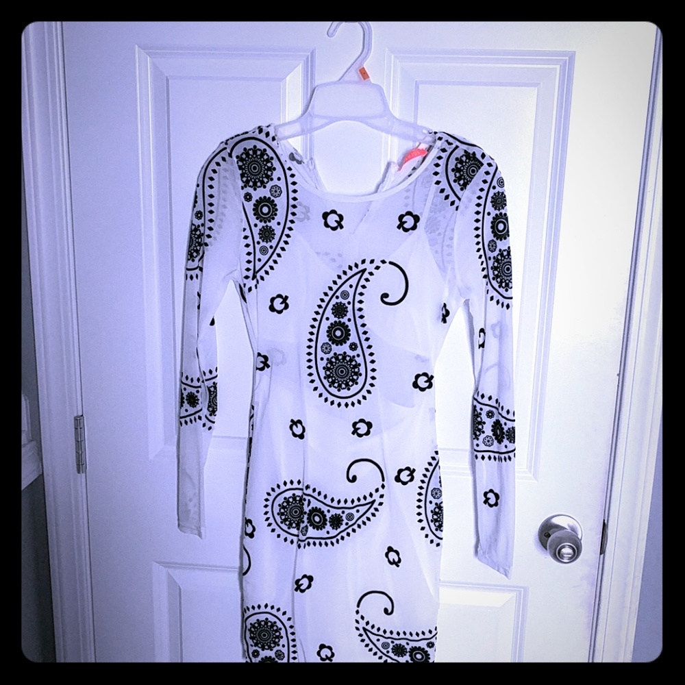 NWOT  Sheer white dress with black detail design.